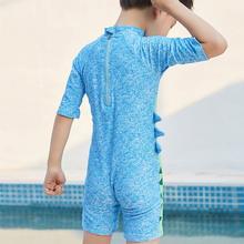Boys swimming in one piece