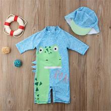 Boys swimming in one piece