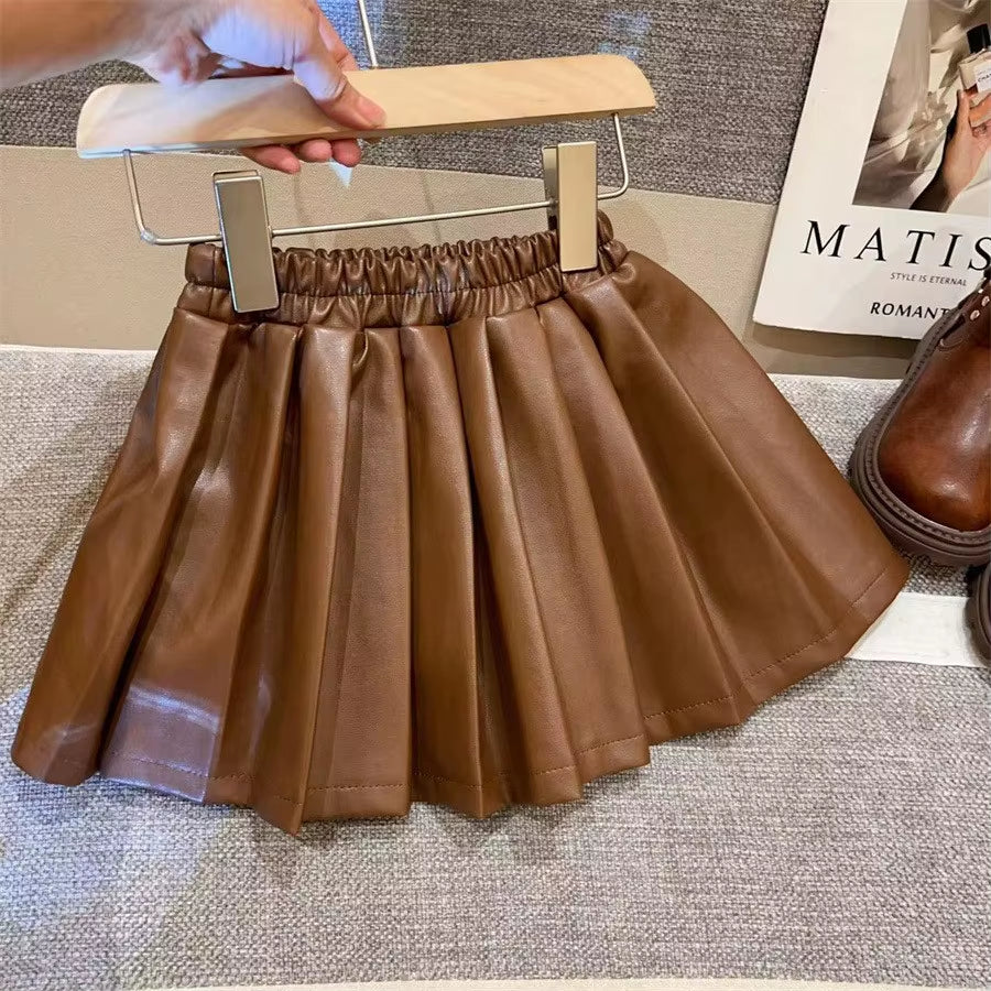 New Children'S Skirt 2025 Autumn/Winter New PU Leather Skirt Solid Color Hundred Fold Half Body Skirt Versatile